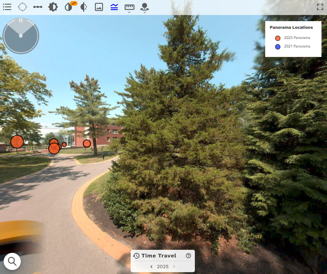Left and right navigation arrows displayed next to the timestamp in the Panoramic Photo Pane for time travel navigation